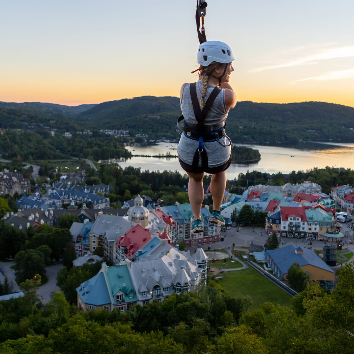 Woman on a zipline in Tremblant.