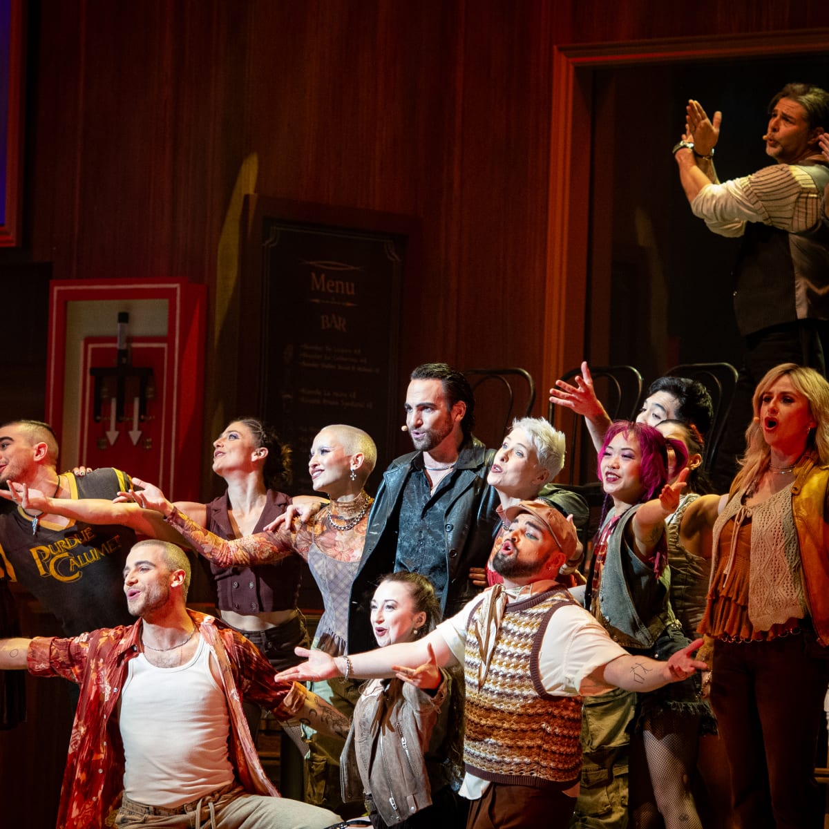 The cast of the Pub Royal musical on the stage during the show.