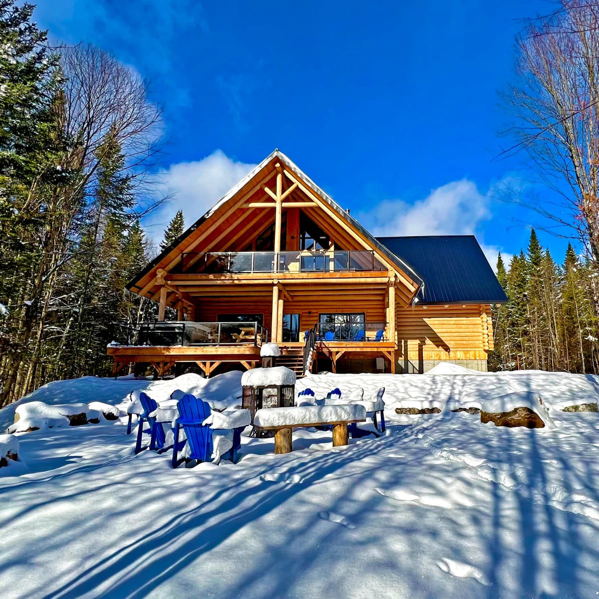 Front of a two-storey log cabin
