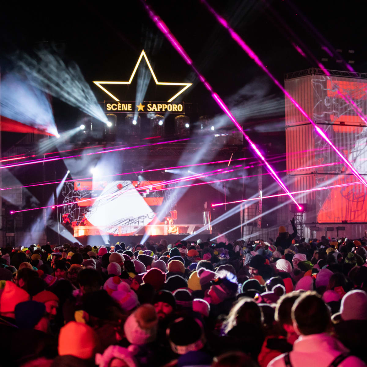 Crowd attending a winter festivals in the evening.