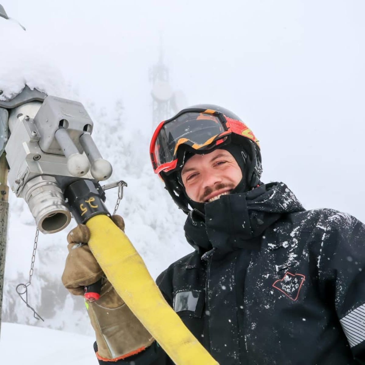 Man working outdoors in winter.