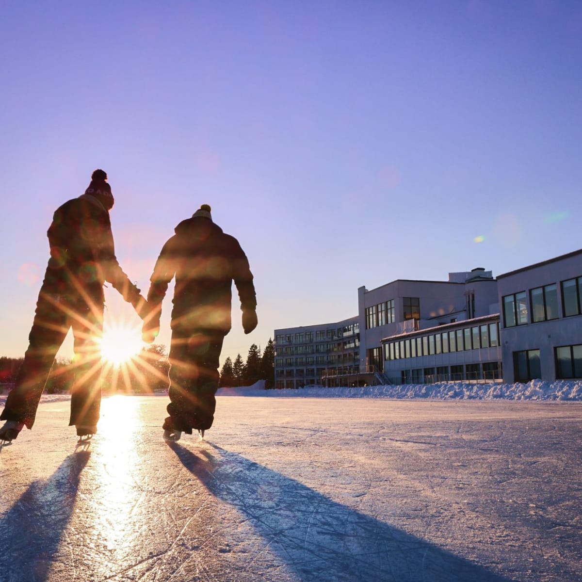 couple on the skating rink at Estérel Resort