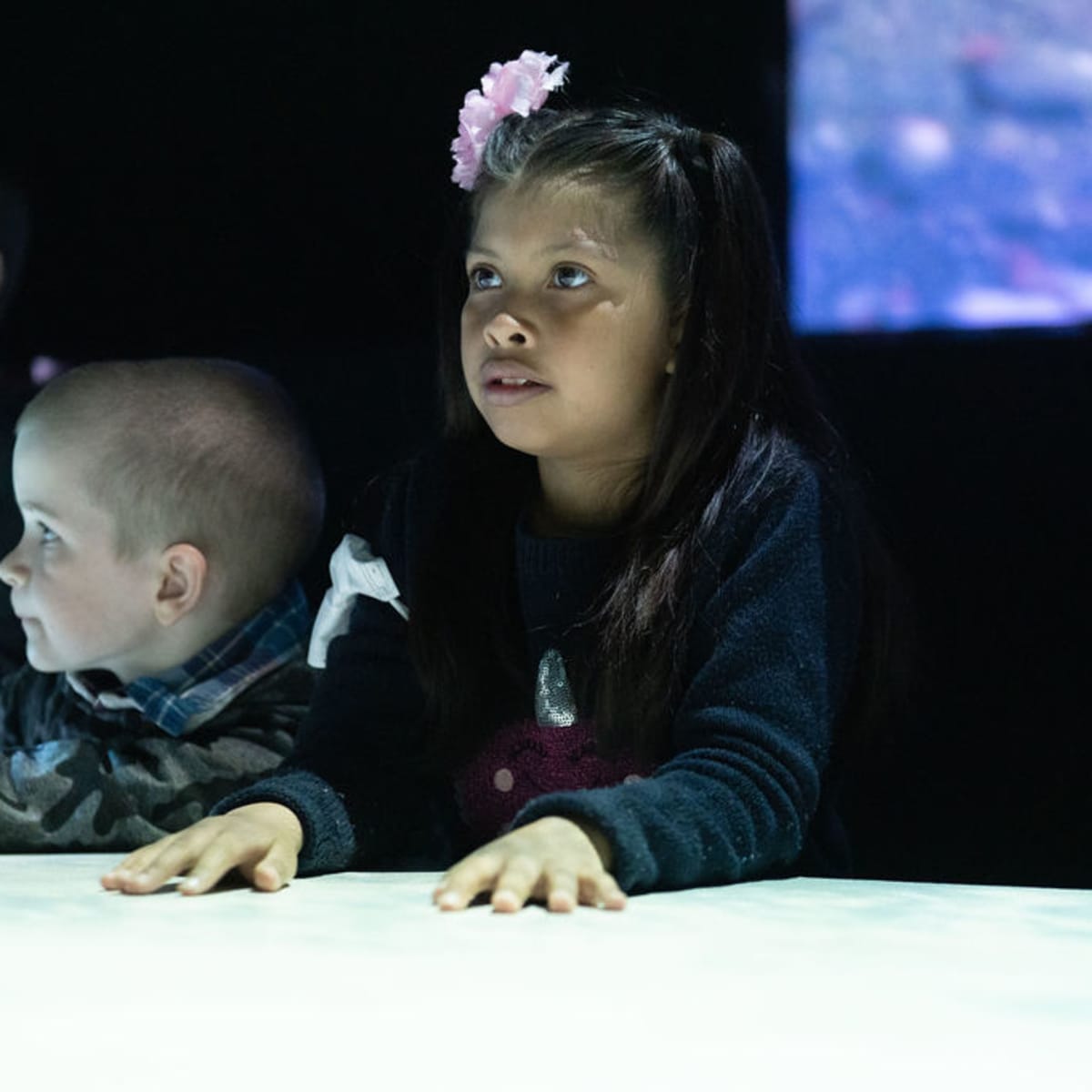 Girl and boys at the Terra Mutantès exhibit at the Sherbrooke Museum of Nature and Science.