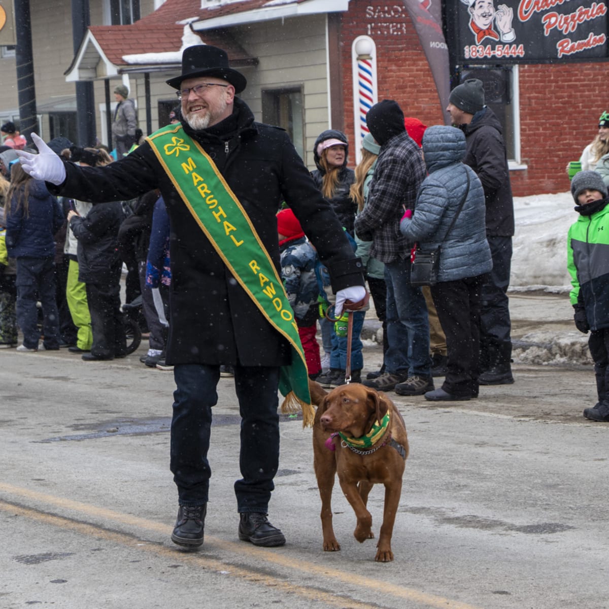 St. Patrick's Day parade marshall and dog.