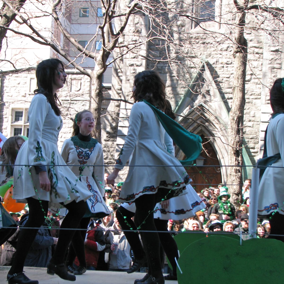 Irish dancers on a parade float.