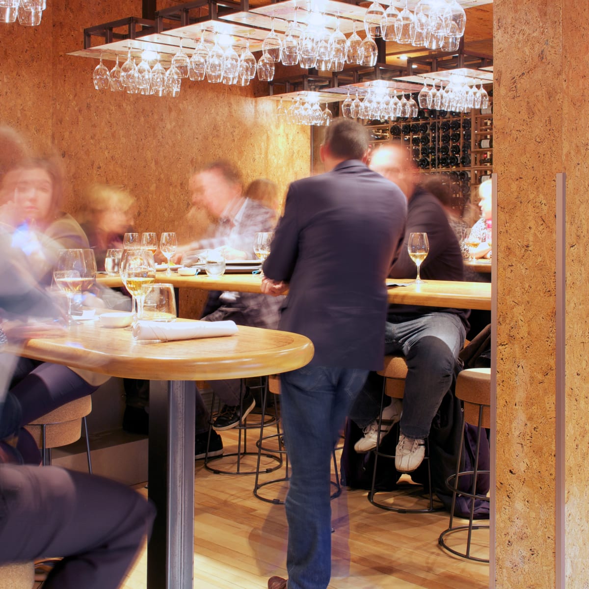 Group of people at a trendy bar.