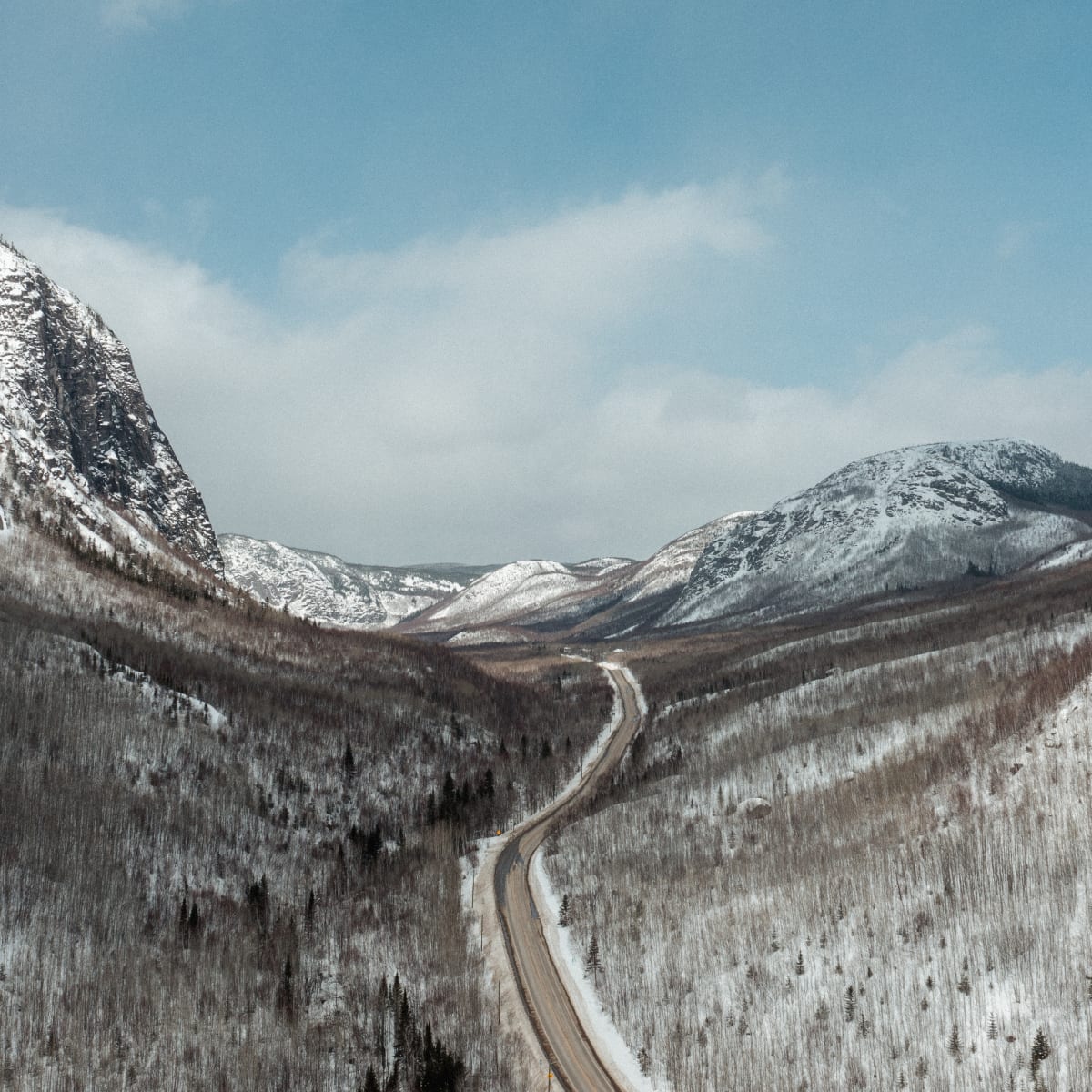 Aerial view of a mountain road in winter - Mountain Road.