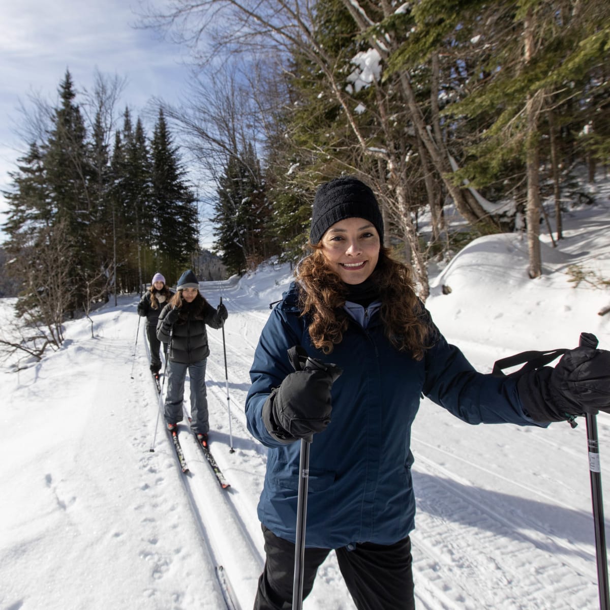 Cross-country skiing in a group.