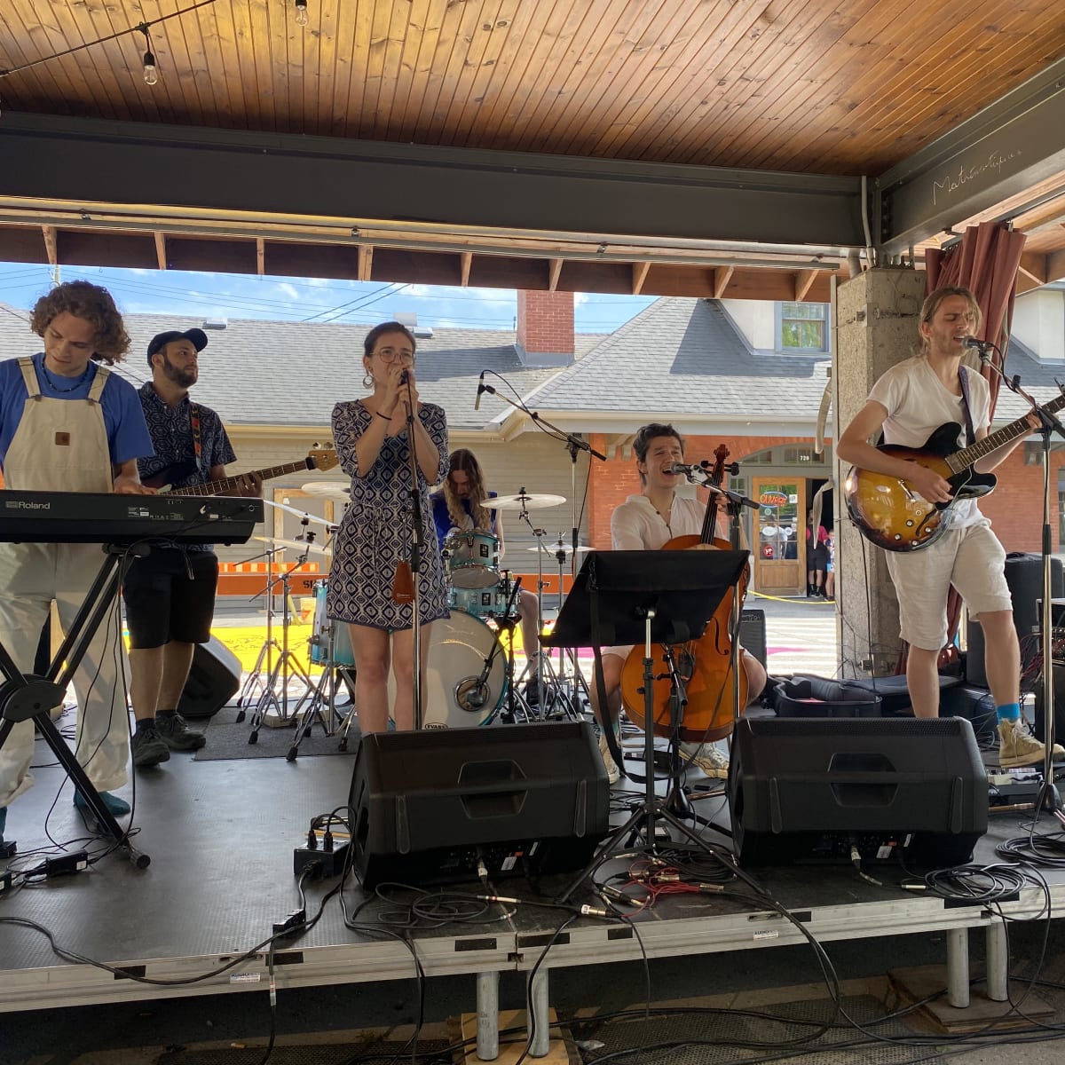 Sherbrooke en musique - Music band performing on an outdoor stage.