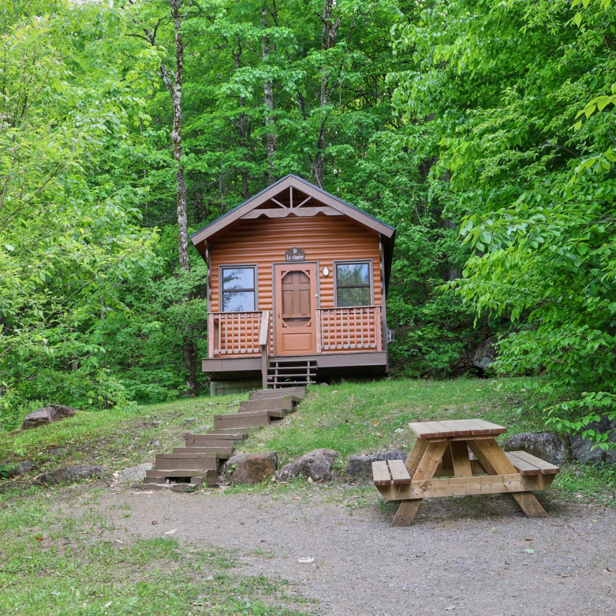 A small cottage surrounded by nature at Sommet Morin Heights.