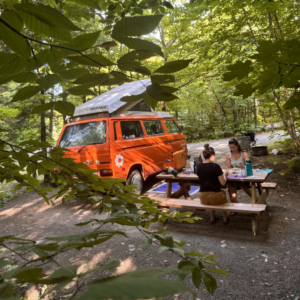 Two women camping at Sommet Morin Heights.