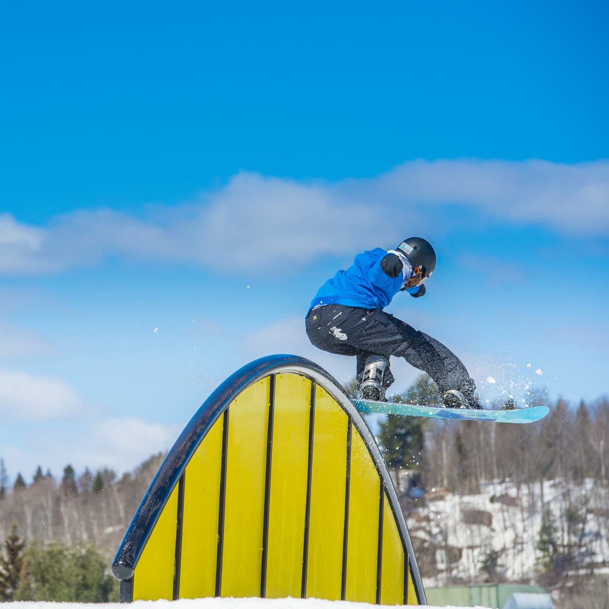 Snowboarding at the Sommet Saint-Sauveur snowpark.