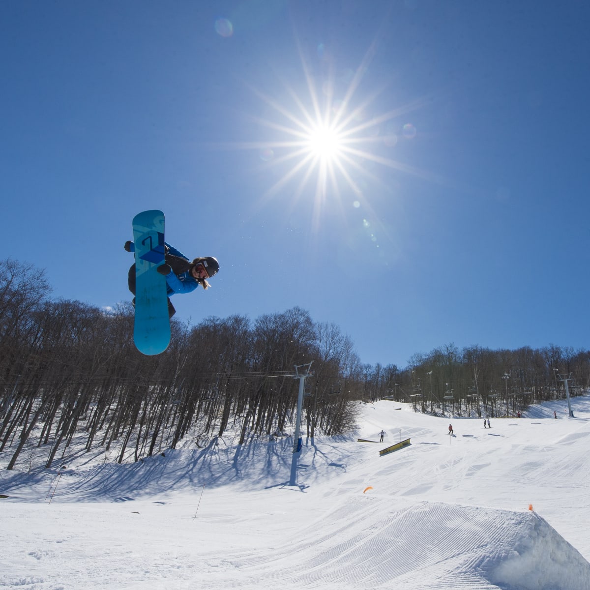 Snowboarding at the Sommet Saint-Sauveur snowpark.