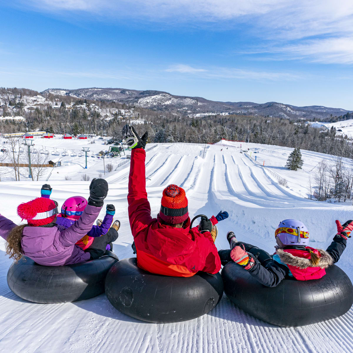 Tubing at Sommet Saint-Sauveur, versant Avila.