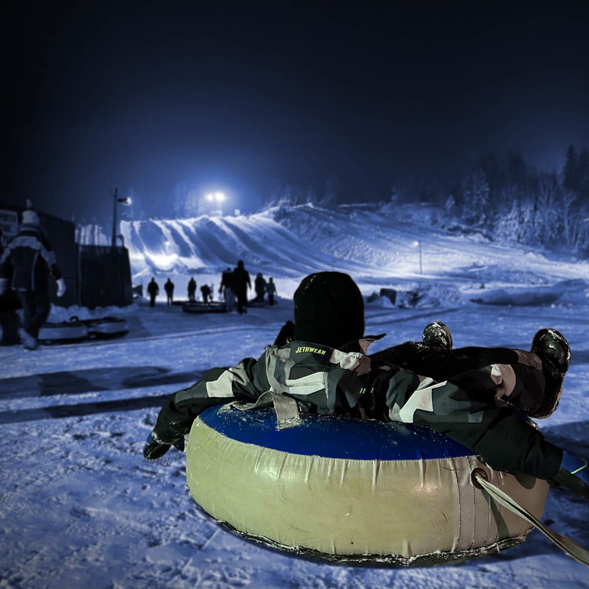 A child at Super Glissades Matha in the evening.