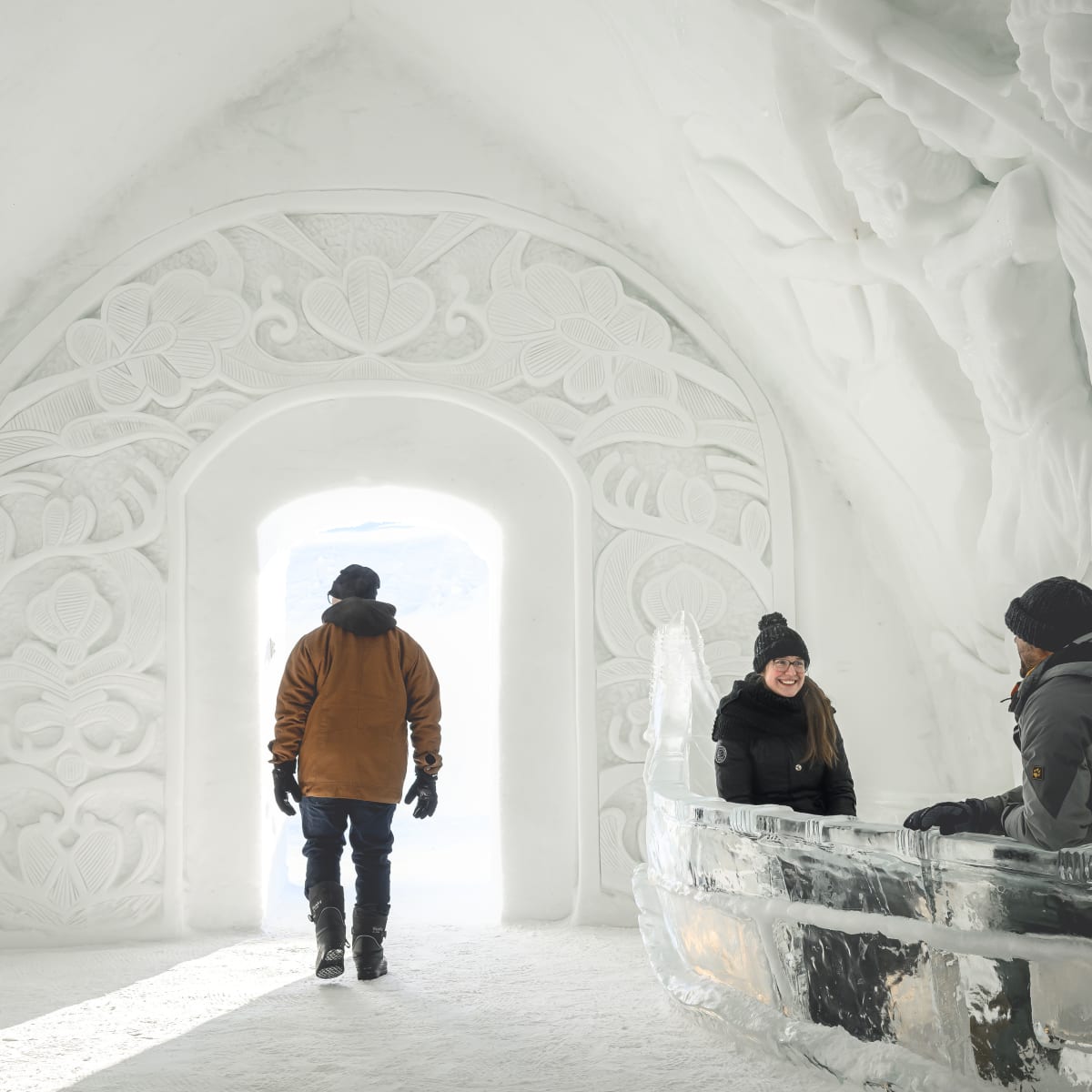Ice hotel - Art sculpted in snow around a doorway