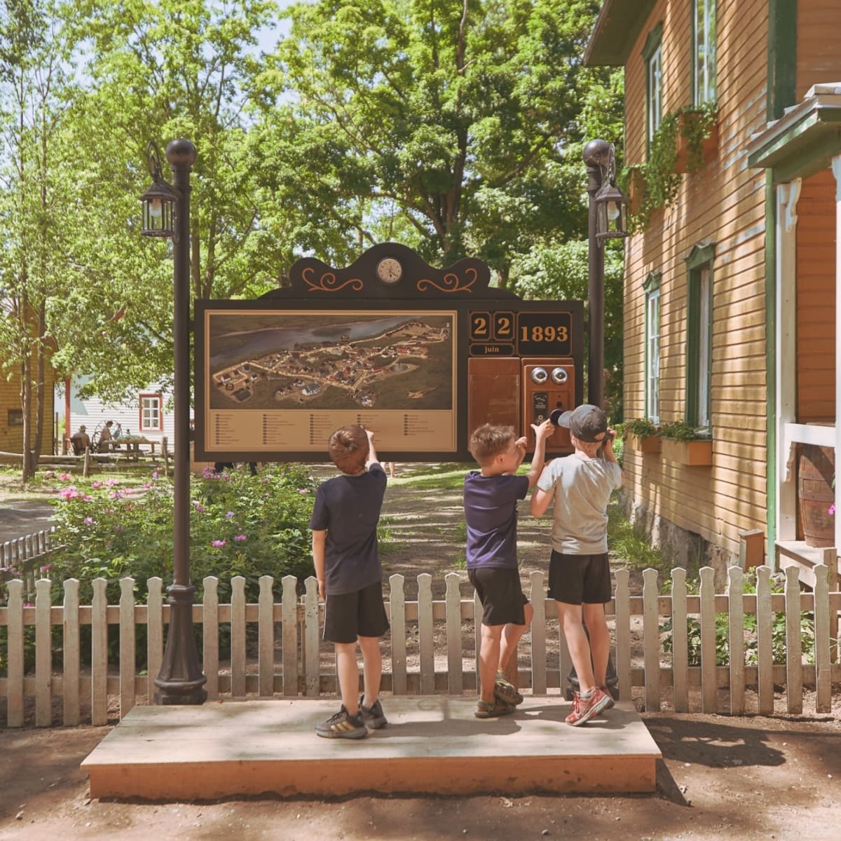 Children looking at a sign.