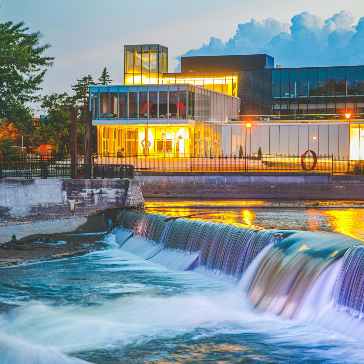 Joliette Art Museum, as seen from the river in the evening.