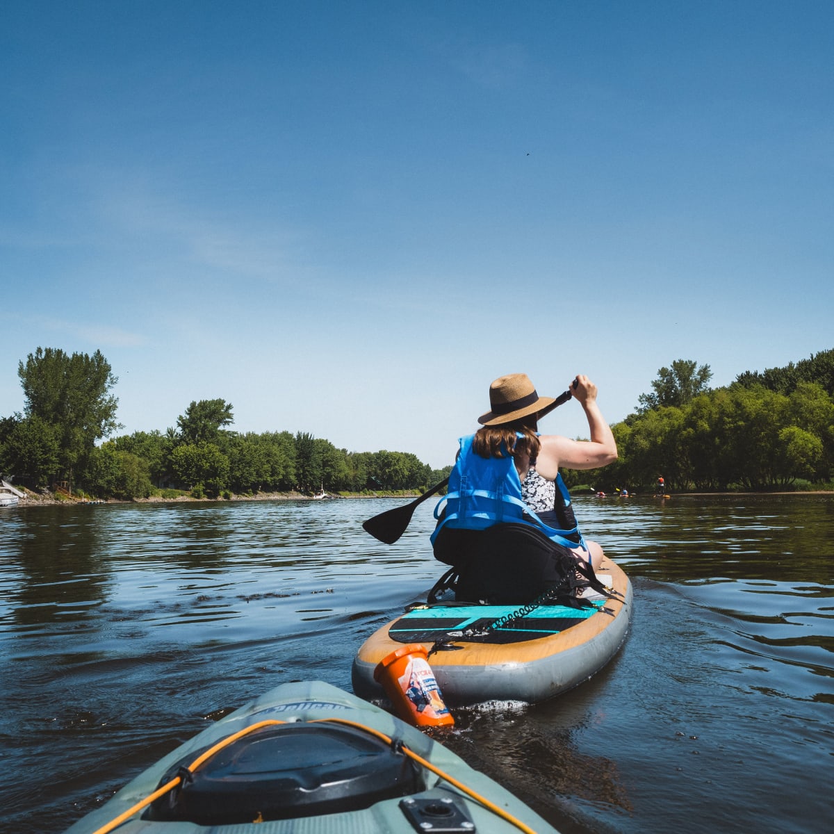 Two people paddleboarding
