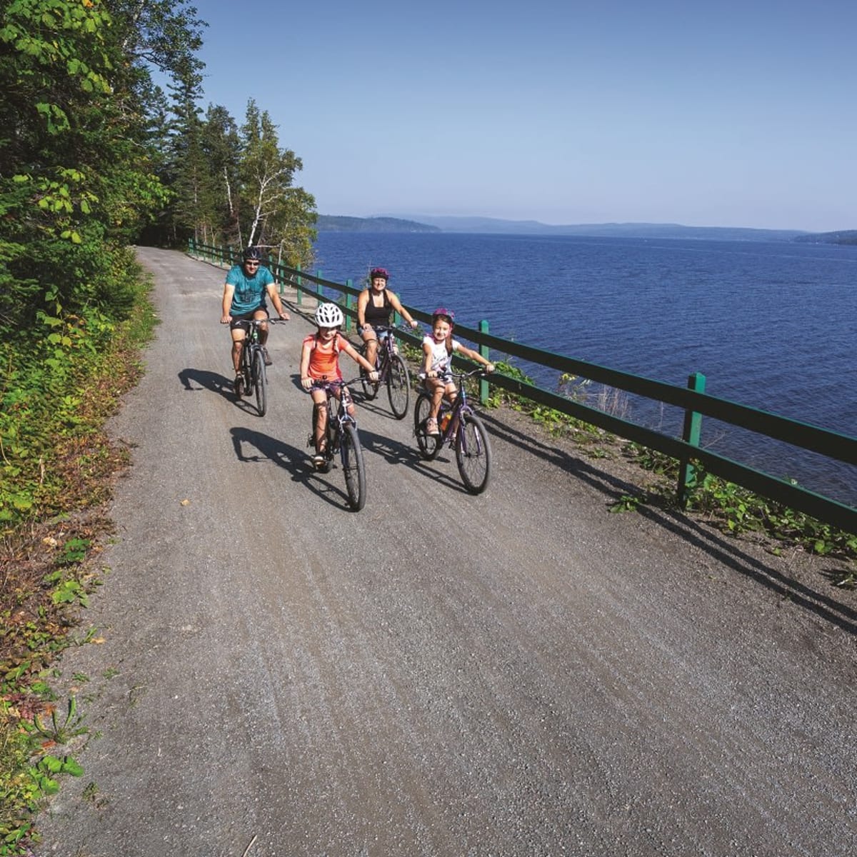 A family on a bike ride in Petit-Témis.