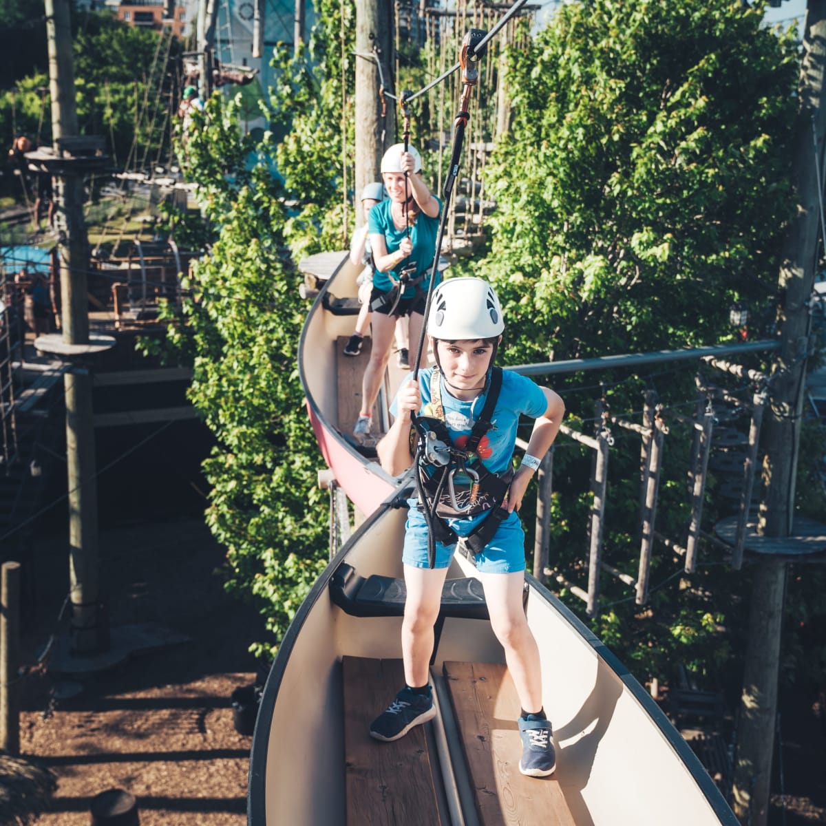 Children on a zip line.