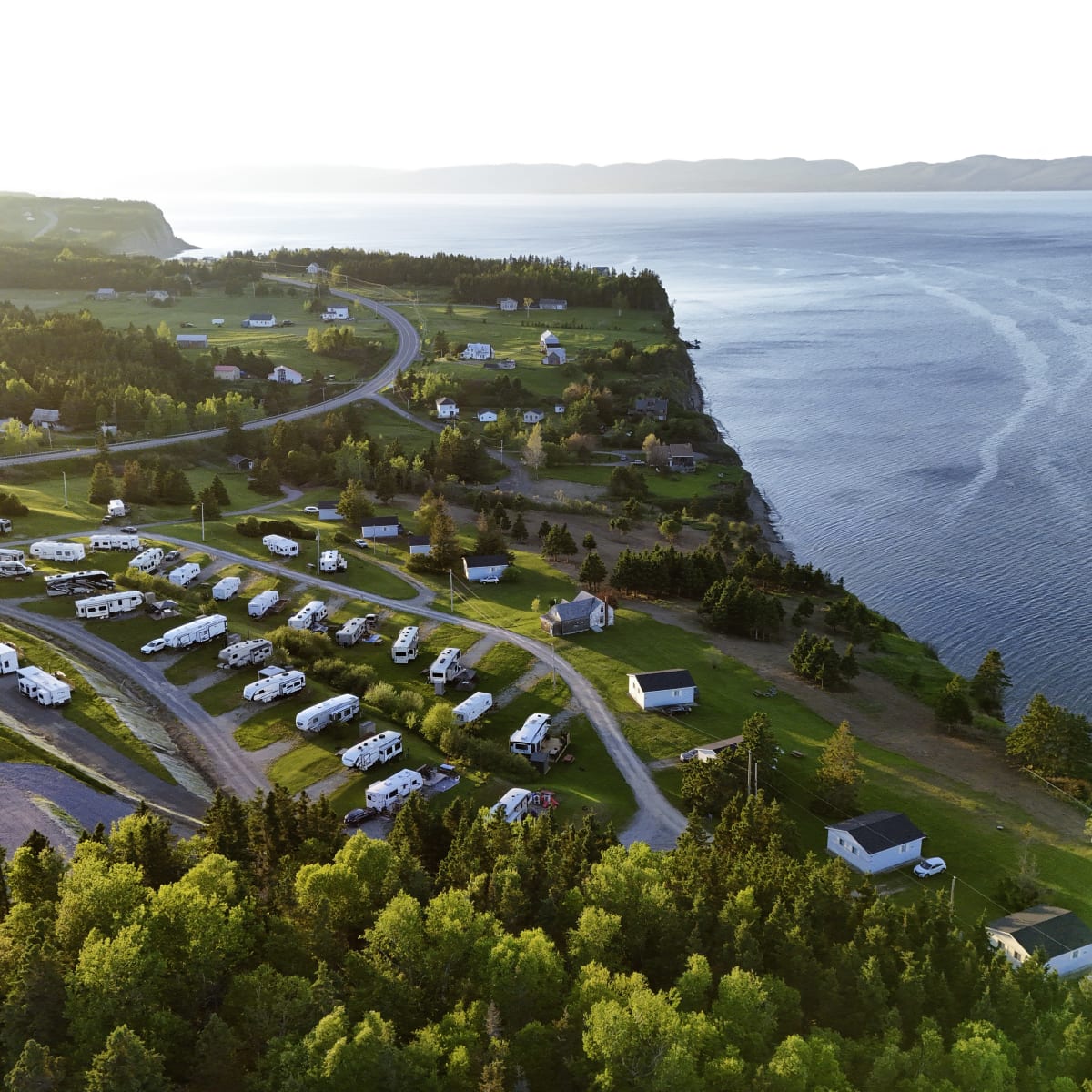 Aerial view of the campground and beachfront cabins in Fort Prével.