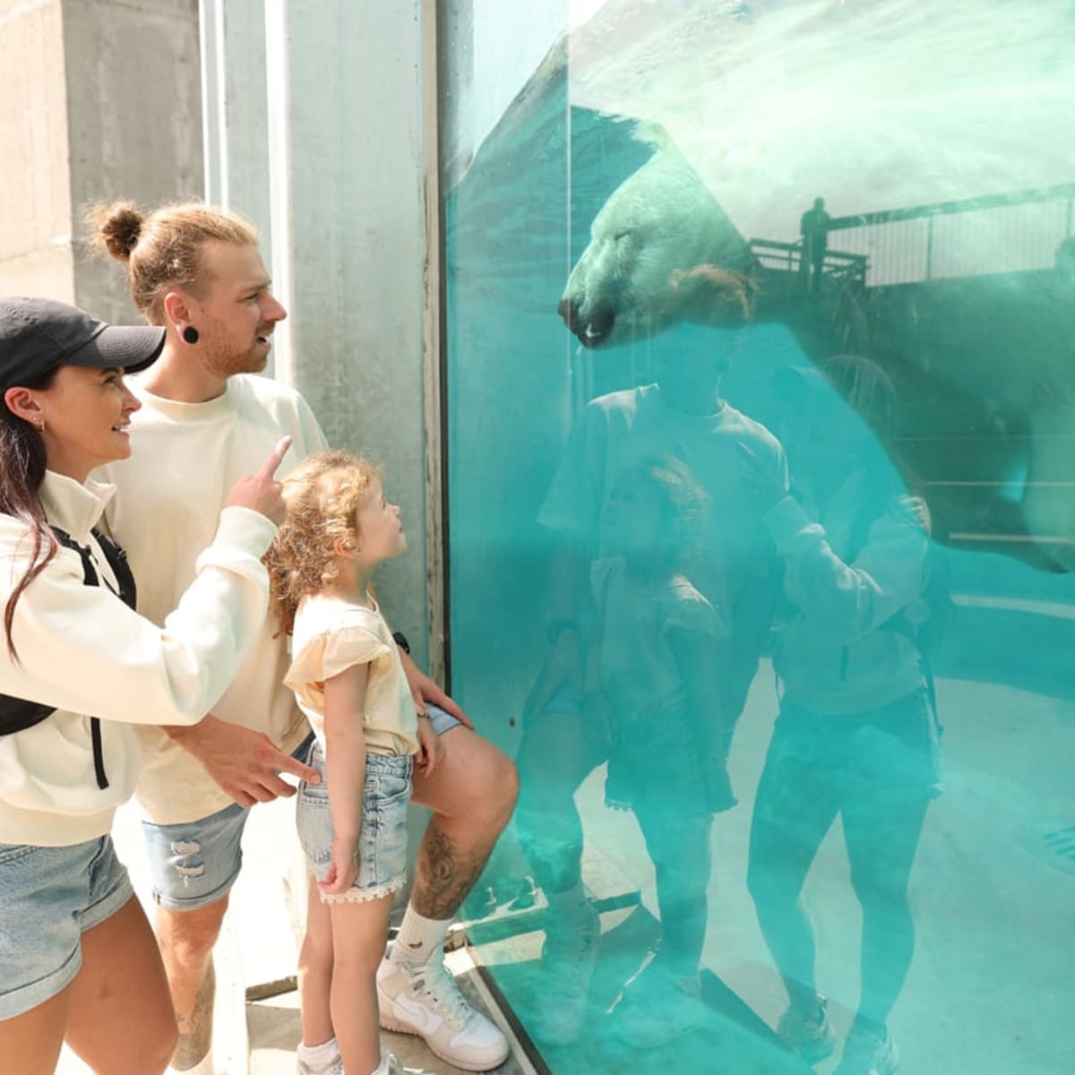 A family at St-Félicien Zoo