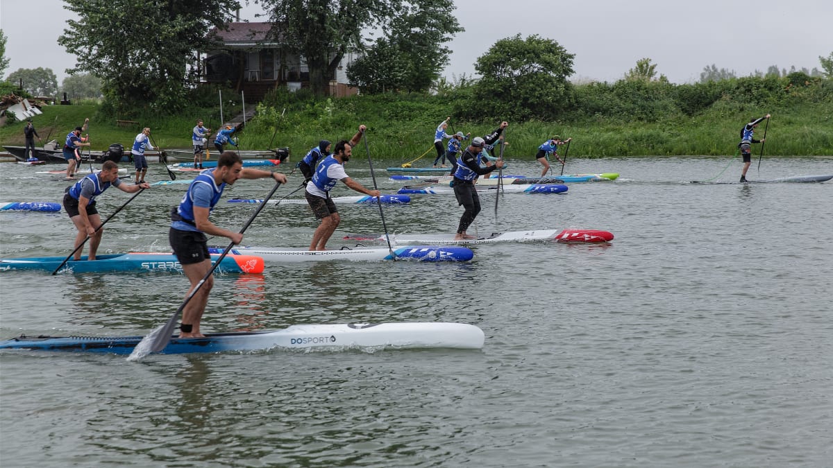 People on paddleboards on the lake.