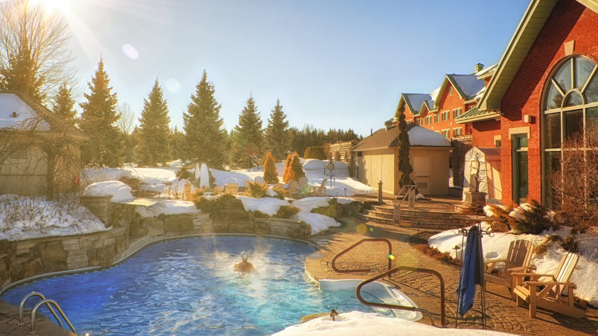 Outdoor spa facilities at the Auberge Godefroy in the winter.
