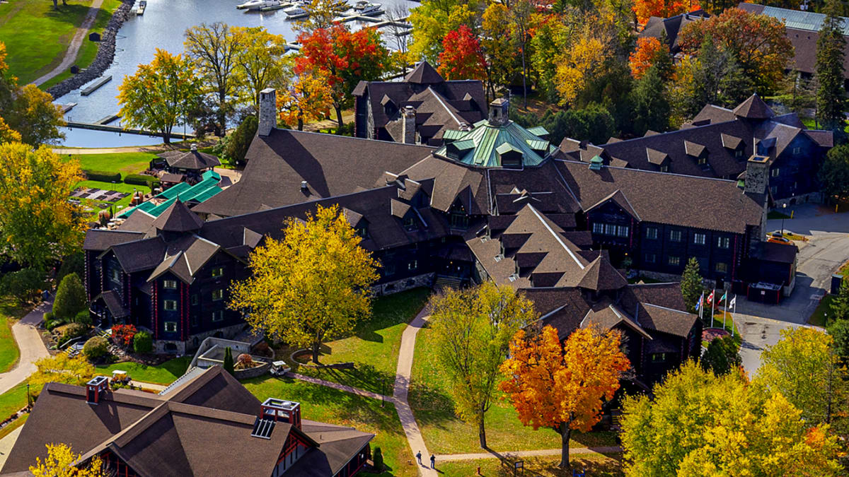 Fairmont Le Château Montebello and the Ottawa River in the fall.