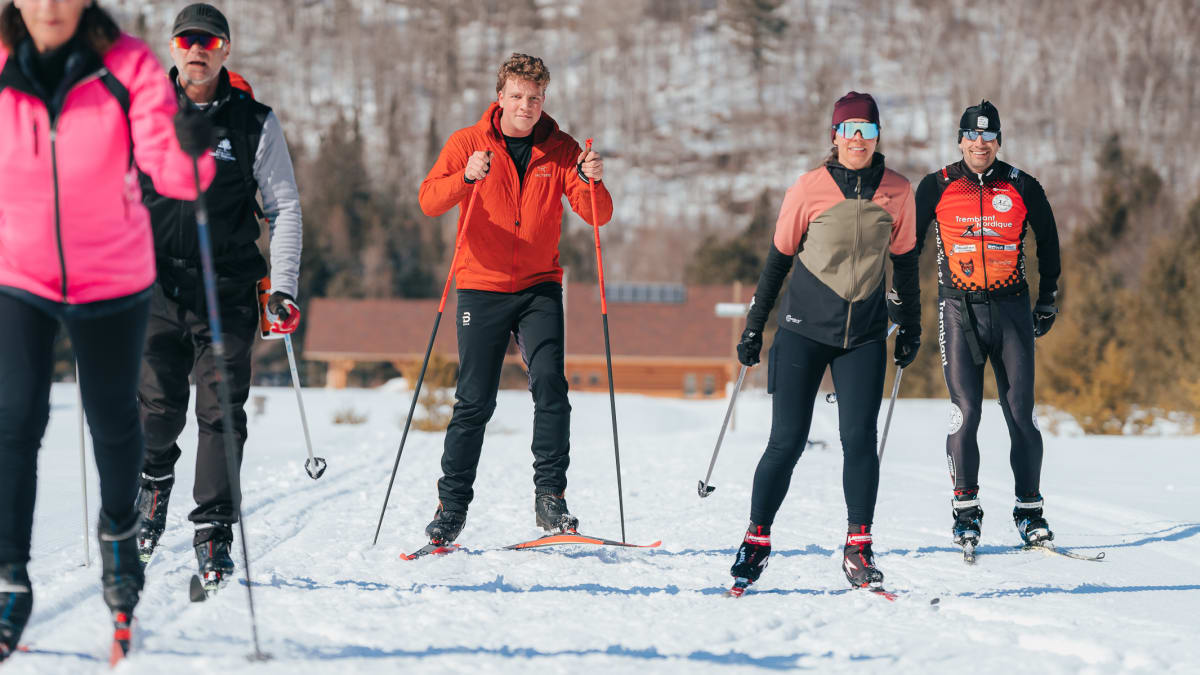 Group of 5 cross-country skiers.