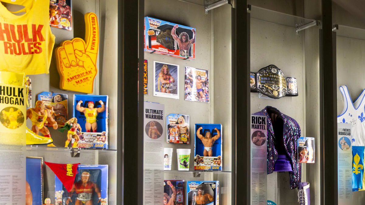 Wall display of wrestling artifacts.
