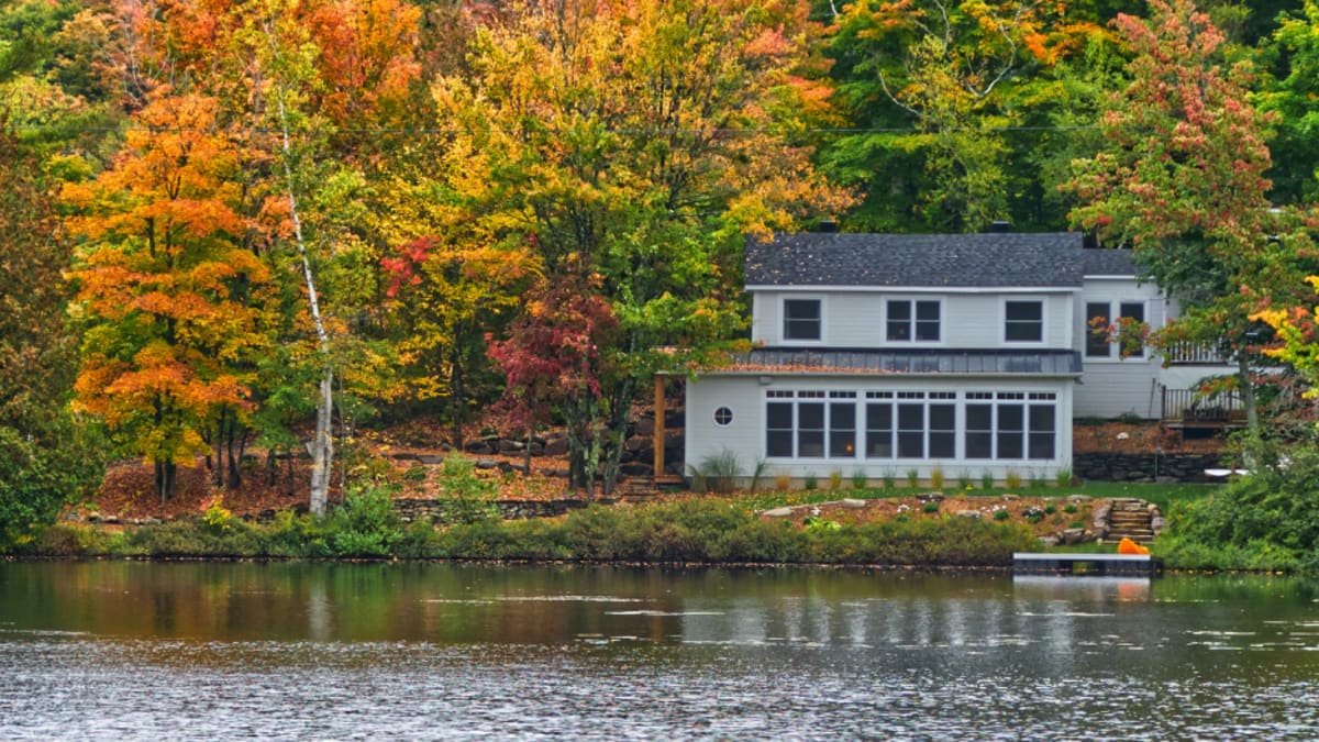 Lakeside house in the fall.