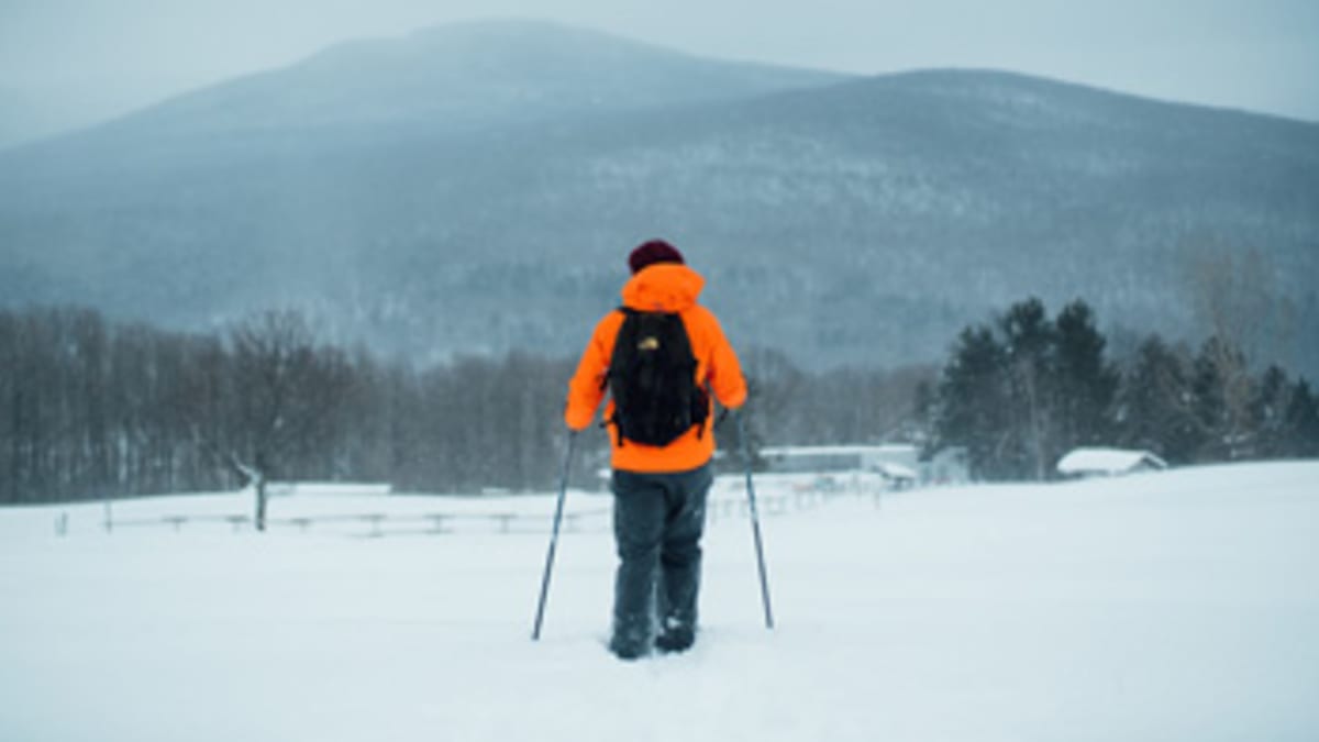 Hiker in the winter at Mont Sutton