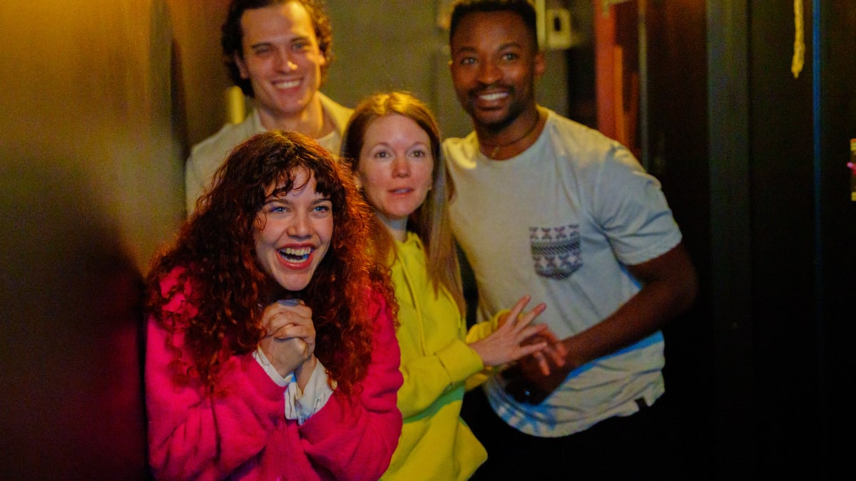 Group of four happy-looking people.