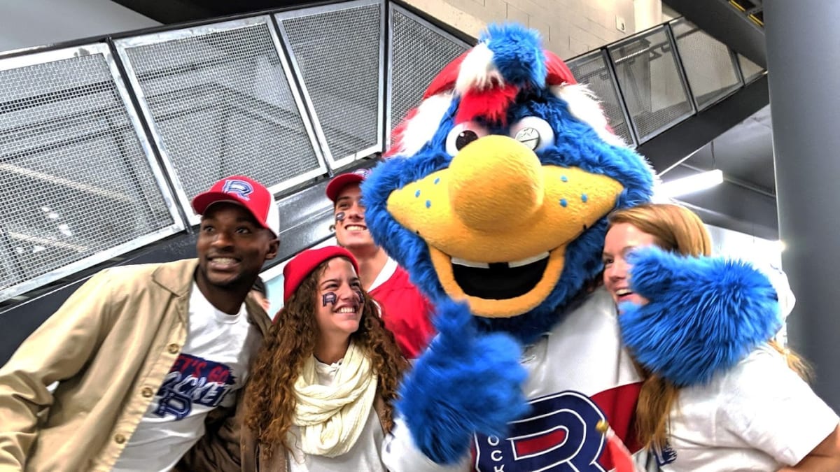 Fans and mascot of the Laval Rocket hockey team.