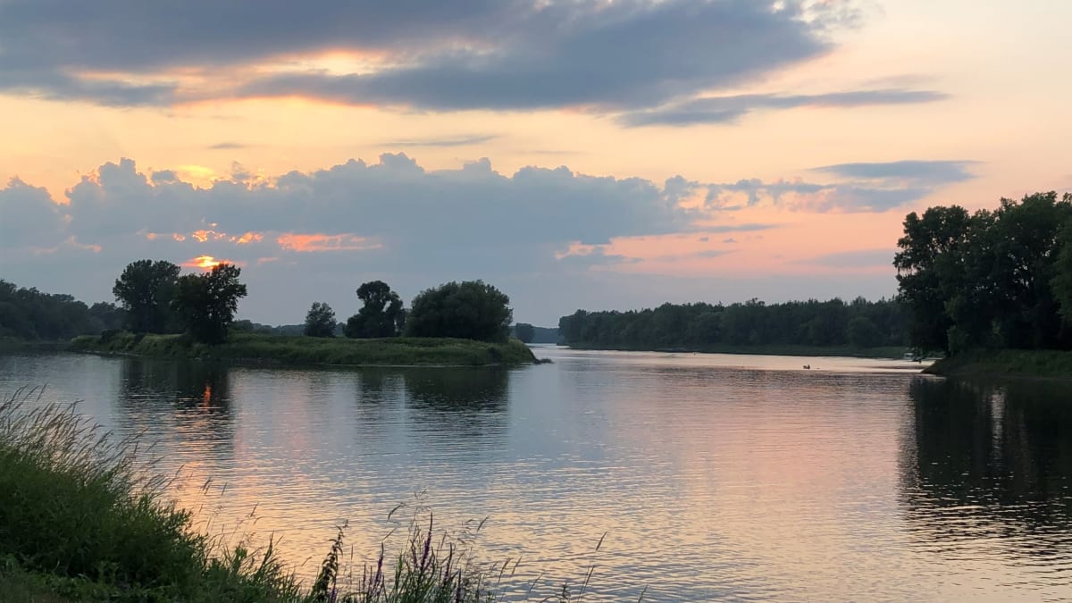 Body of water at sunset