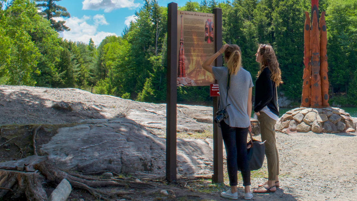 Two women on a trail at Parc Oméga.