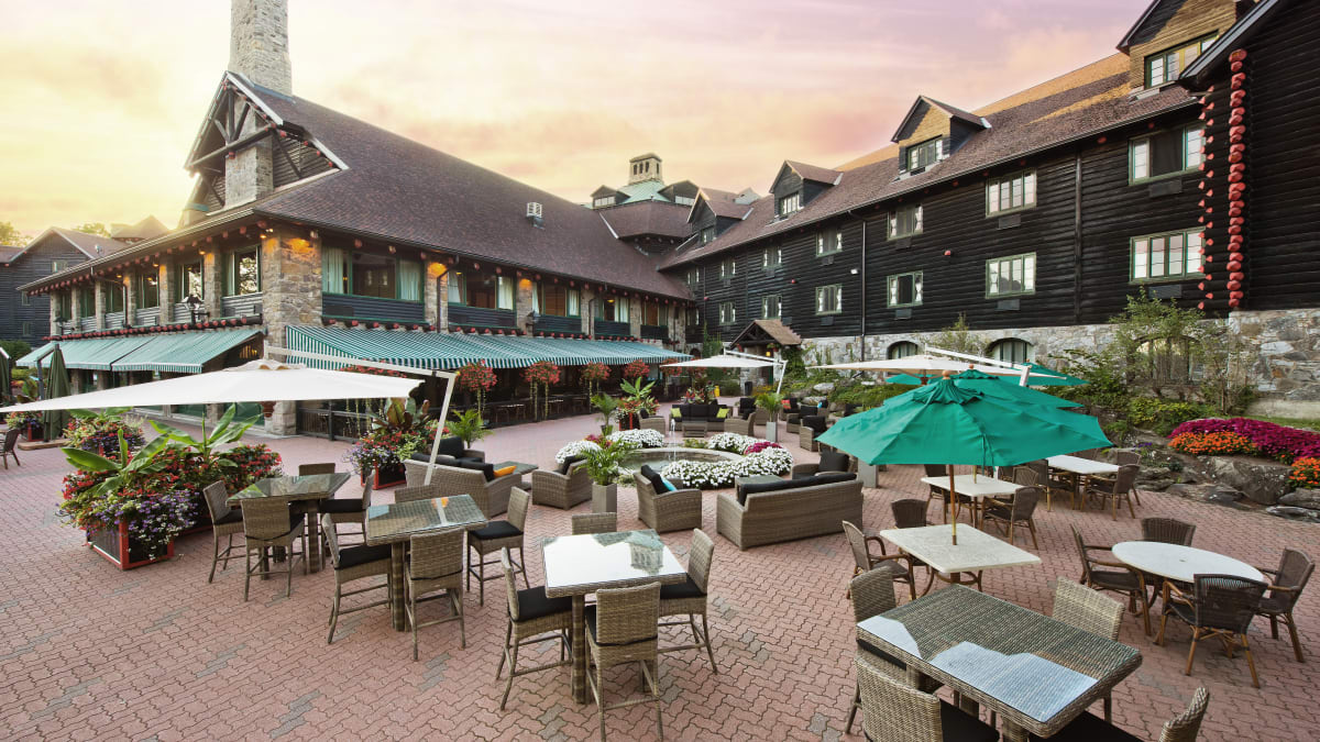 Outdoor terrace at Fairmont Le Château Montebello at sunset