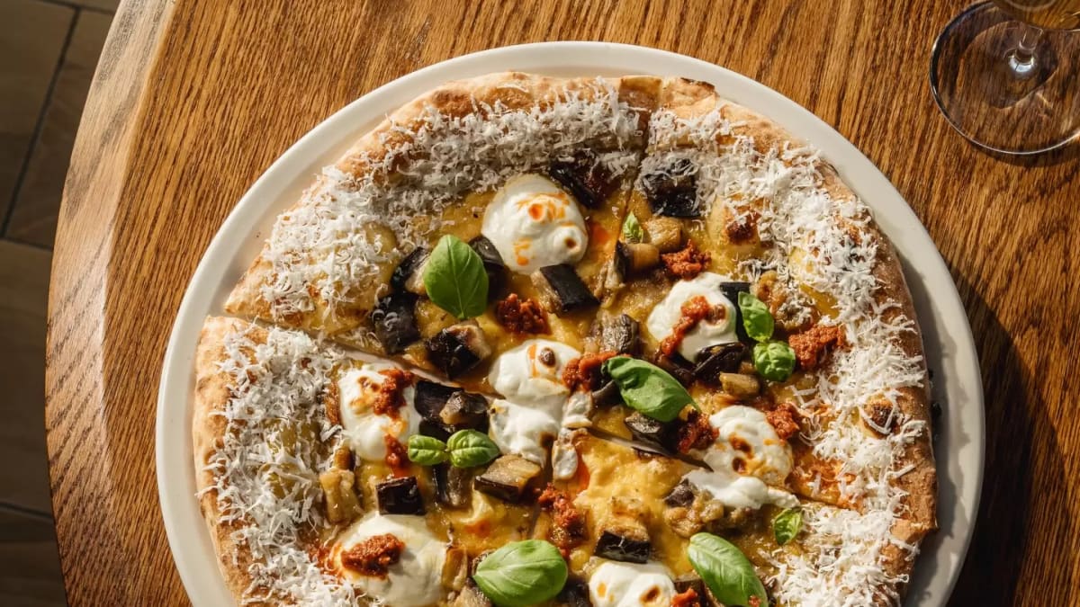 Pizza on a table.