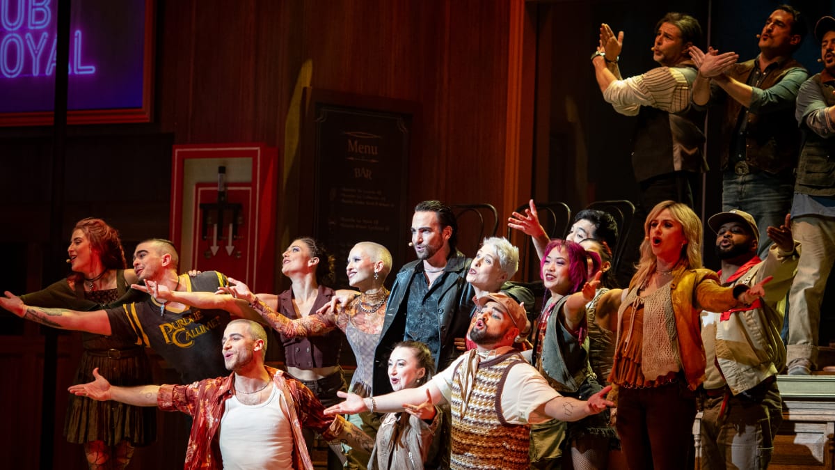 The cast of the Pub Royal musical on the stage during the show.