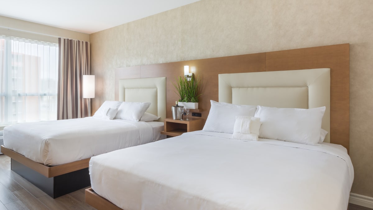 Interior of a two-bed prestige room at Hotel Universel