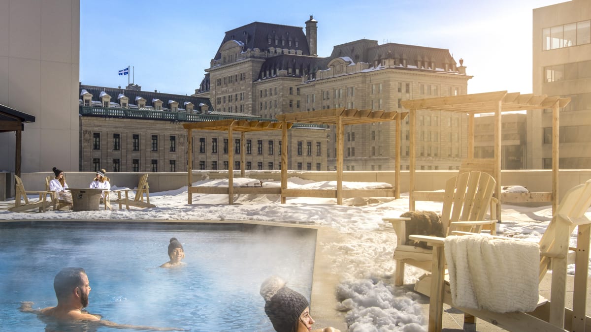 Outdoor pool on the roof of a hotel in winter.