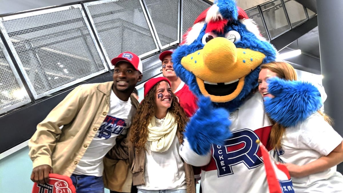 Fans and mascot of the Laval Rocket hockey team.