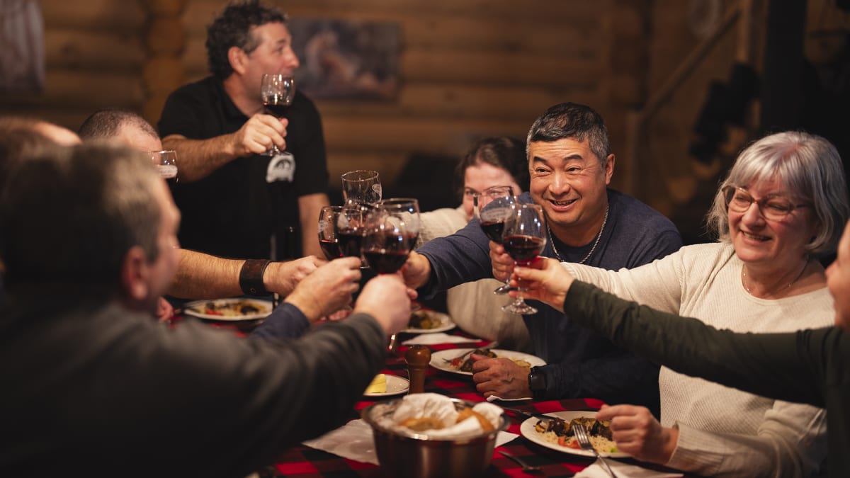 Group of friends around the table for the holidays.