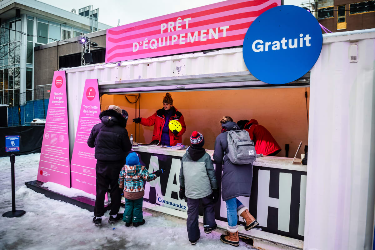 Family at slides in Montréal.