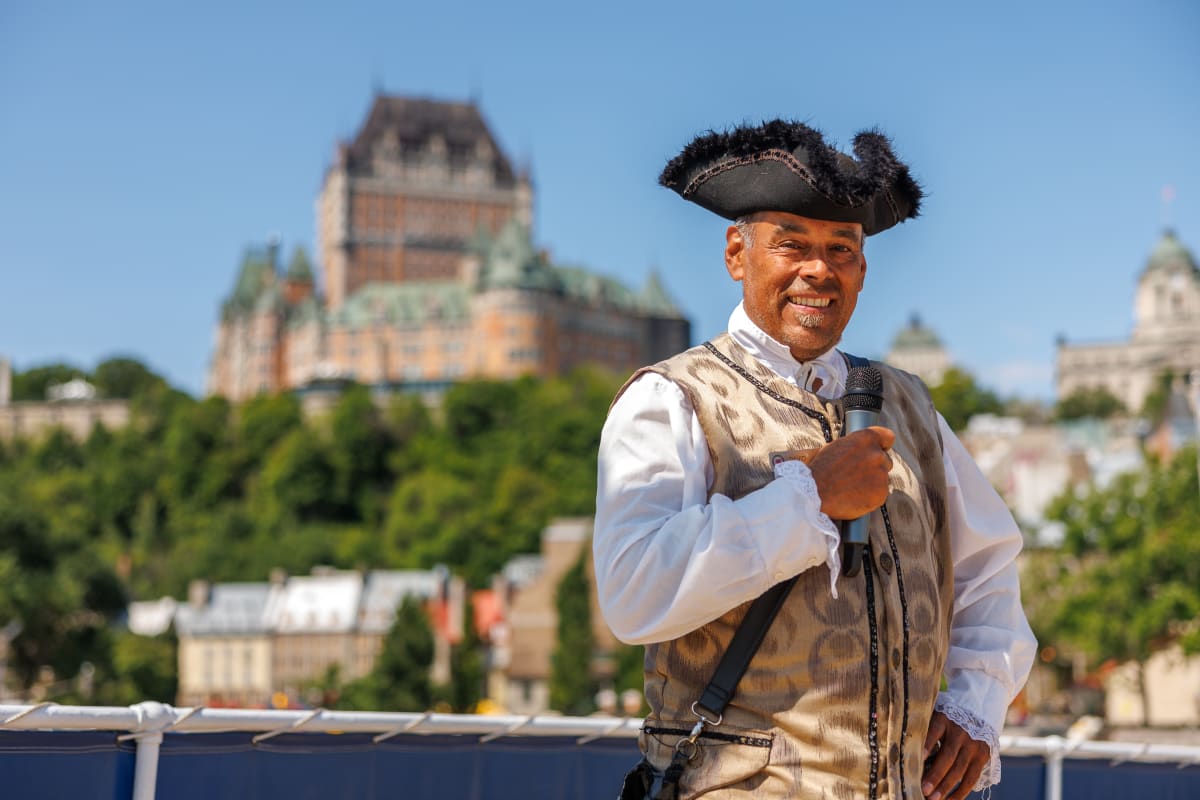 Guide in a period costume on a cruise in Québec City.