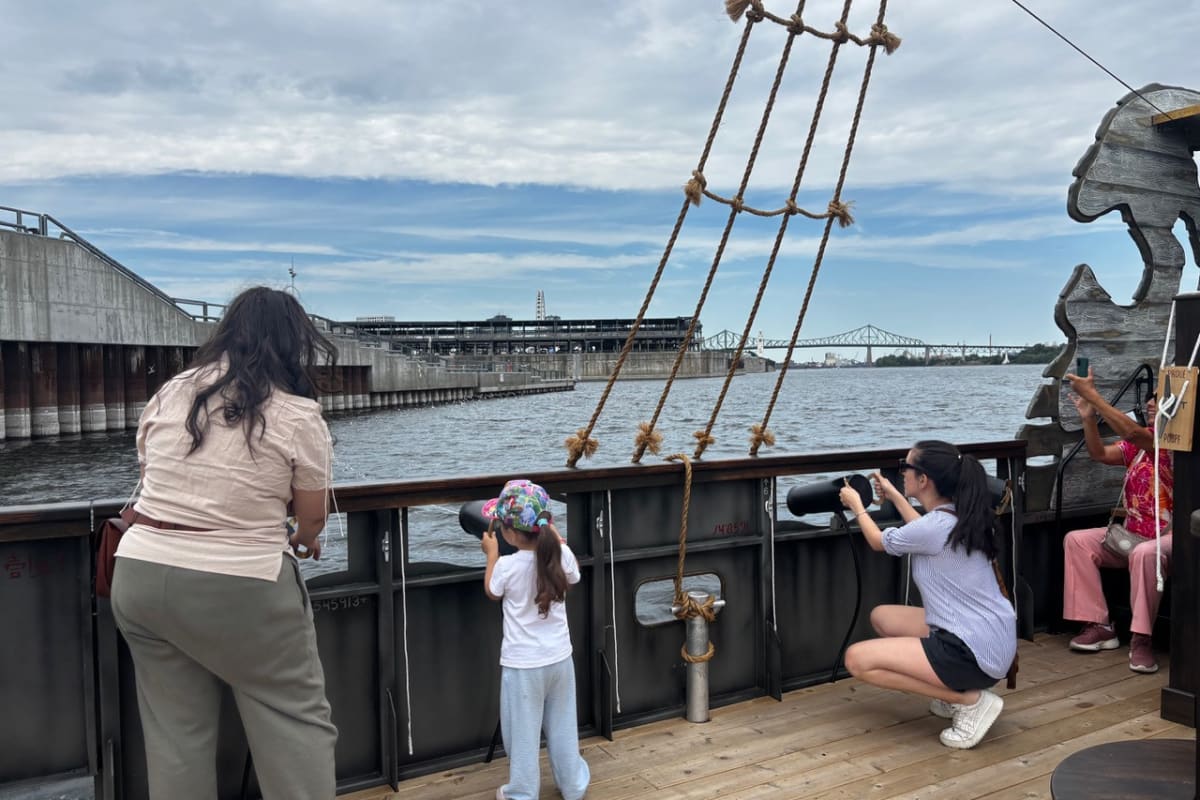 Kids and parents on a pirate ship.