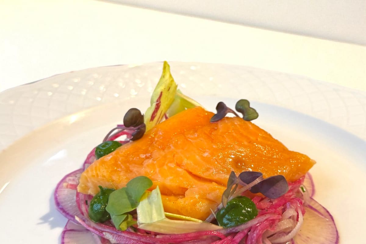 Carefully plated dish of Arctic char.