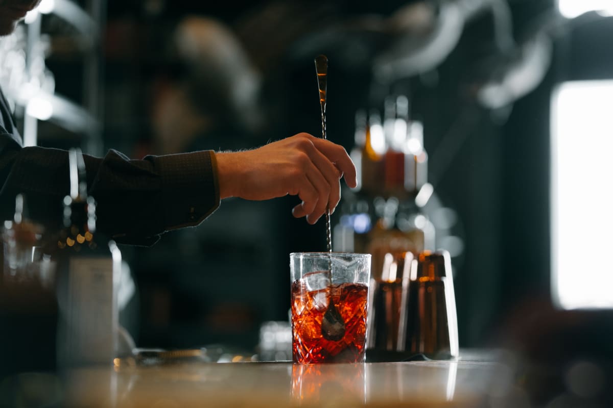 Mixologist stirring a cocktail at the bar at the Château Frontenac.